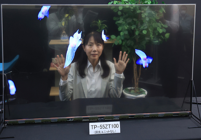 Panasonic announces transparent OLED display. November 20, 2020, Kadoma, Japan   Japanese electronics giant Panasonic unveils 55 inch sized transparent organic light emitting diode  OLED  panel at the company s laboratory in Kadoma city in Osaka on Friday, November 20, 2020. Panasonic will put two models on the market next month, one is see through model and another is dimmable model with dimming unit which can display high contrast and clear images.        Photo by Yoshio Tsunoda AFLO  