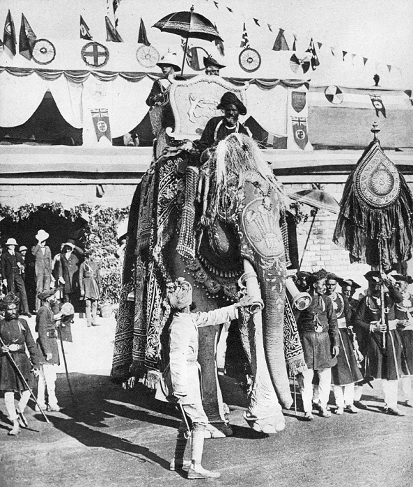 Edward VIII  1921  The Prince of Wales with the Maharajah of Gwalior during his Indian tour, 1921. The future King Edward VIII and his host ride in the howdah of a decorated elephant. Illustration from  George V and Edward VIII, A Royal Souvenir , by FGH Salusbury, a souvenir book published as Edward VIII was crowned following the death of his father, George V,  Daily Express Publication, London, 1936 .   