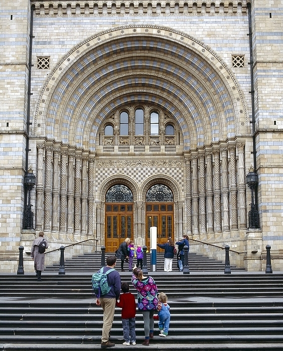 Natural History Museum entrance Natural History Museum entrance. Visitors on the steps leading up to the Cromwell Road facade and front entrance of the Natural History Museum, London, UK. This main building of the museum is known as the Waterhouse Building, after the British architect Alfred Waterhouse  1830 1905  who designed it. This building first opened its doors to the public on Easter Monday 1881.