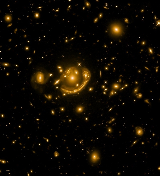 Einstein ring, Hubble Space Telescope image Optical infrared image  coloured  of the Einstein ring GAL CLUS 022058 38303 by the Hubble Space Telescope. This Einstein ring is one of the largest Einstein rings known. It is caused by light from two distant galaxies being diverted and bent by gravitational lensing from a massive elliptical galaxy in front of them and focused into a visible ring like complex structure.