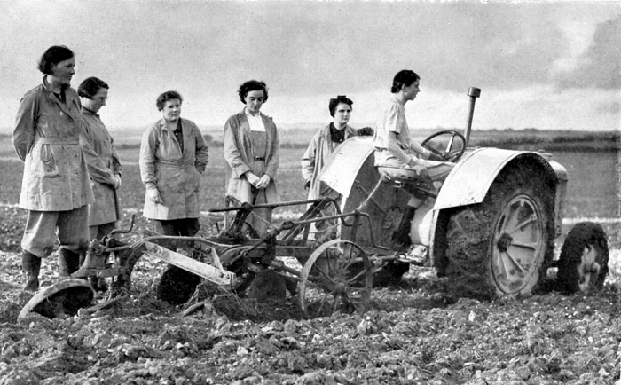 British girls of the Women's Land Army learning to plough with a tractor. World War II