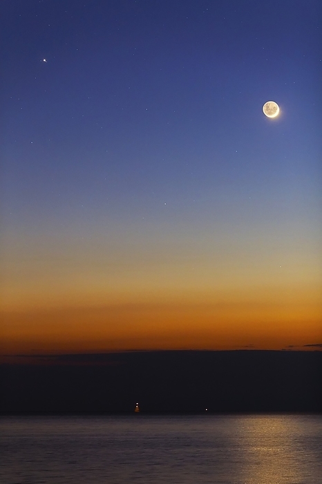 Moon with Jupiter, Mars and Mercury Moon with Jupiter, Mars and Mercury. The crescent Moon  upper right  is seen above the glow of the rising Sun on the horizon. Three planets are visible to the left of the Moon, forming a diagonal line corresponding to the ecliptic, the plane of the planetary orbits. At top left is Jupiter  brightest , with Mars at upper centre  directly left of the Moon , and Mercury on the same line, below and to the left of the Moon. Photographed from Buenos Aires, Argentina, on 4 August 2013.