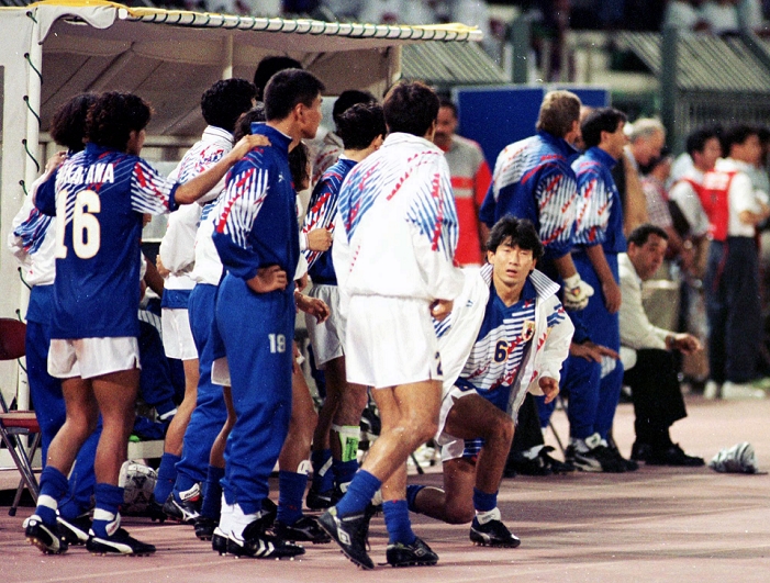 1994 FIFA World Cup Asia Final Qualifier Japan team group  JPN , OCTOBER 28, 1993   Football   Soccer : Japan vs. Iraq: Japan misses first World Cup appearance after being overtaken by Iraq  Date Toshifumi Tomonami  front right  nods in disappointment on the bench. 19931028  Location  Doha, Qatar FIFA World Cup USA 1994 Asian Qualify Final Round match between Japan 2 2 Iraq at Al Ahli Stadium in Doha, Qatar. The match later became known as the Agony of Doha.