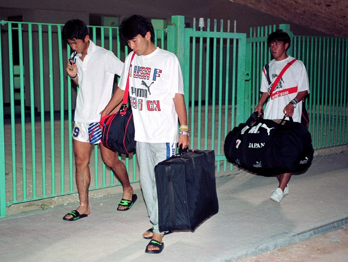1994 FIFA World Cup Final Qualifying Round in Asia Doha Tragedy  L R  Nobuhiro Takeda, Satoshi Tsunami, Masaaki Sawanobori  JPN , OCTOBER 28, 1993   Football   Soccer : From left, Shuhiro Takeda, Satoshi Tsunami, and Masao Sawanobori leave the venue with a depressed look on their faces after Japan missed out on the World Cup by a goal in the final Asian qualifying match between Japan and Iraq at the 1994 FIFA World Cup USA. FIFA World Cup USA 1994 Asian Qualify Final Round match between Japan 2 2 Iraq at Al Ahli Stadium in Doha, Qatar. The match later became known as the Agony of Doha.