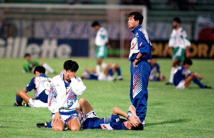 1994 FIFA World Cup Final Qualifying Round in Asia Doha Tragedy  L R  Yasutoshi Miura, Kazuyoshi Miura, Eijun Kiyokumo  JPN , OCTOBER 28, 1993   Football   Soccer : The Japan national team nods in agreement on the pitch after Japan drew with Iraq in the final Asian qualifying round for the World Cup in the United States and missed the World Cup. In the center is Tomoyoshi Miura, on the left is Yasutoshi Miura, and on the right is coach Eijun Seiun. FIFA World Cup USA 1994 Asian Qualify Final Round match between Japan 2 2 Iraq at Al Ahli Stadium in Doha, Qatar. The match later became known as the Agony of Doha.