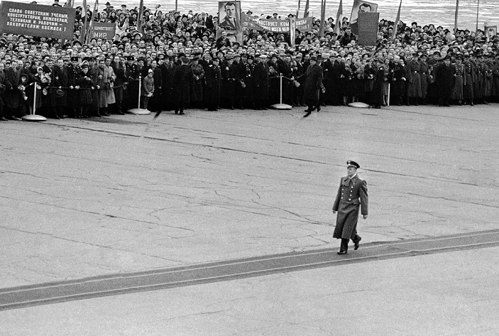 World Events  First manned space flight  1961  Yuri Gagarin  1934 1968 , soviet cosmonaut and first man in space, at a red carpet ceremony after his historical spaceflight. Gagarin made the first manned space flight on 12 April 1961. He orbited the Earth once in the Vostok 1 spacecraft, a flight that lasted 1 hour and 48 minutes. Gagarin became a hero in the Soviet Union and famous worldwide. He later returned to active service as a test pilot, dying in a crash during a training flight in 1968. His ashes were interred with full military honours in the Kremlin Wall. Photographed at Vnukovo Airport, Moscow, in 1961.