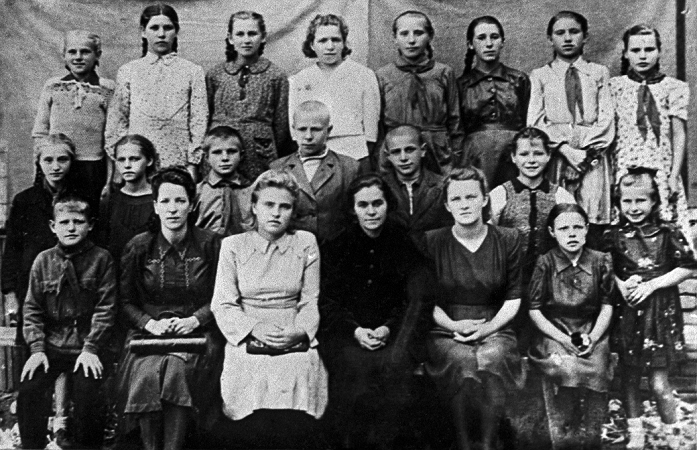 Yuriy Gagarin  Date taken unknown  Gagarin and school mates. Yuri Gagarin  1934 1968, middle row, third from left , Soviet cosmonaut and first man in space, in a school photograph. Gagarin made the first manned space flight on 12 April 1961. He orbited the Earth once in the Vostok 1 spacecraft, a flight that lasted 1 hour and 48 minutes. Gagarin became a hero in the Soviet Union and famous worldwide. He later returned to active service as a test pilot, dying in a crash during a training flight in 1968. His ashes were interred with full military honours in the Kremlin Wall.