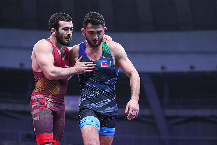 Individual Wrestling World Cup Iszmail MUSZUKAJEV  HUN  df. Haji ALIYEV  AZE      Individual Wrestling World Cup Iszmai Hungary s Ismail Musukaev  R  and Azerbaijan s Haji Aliyev during the men s 65kg freestyle semi final of Individual Wrestling World Cup in Belgrade, Serbia on December 17, 2020.  Photo by AFLO 
