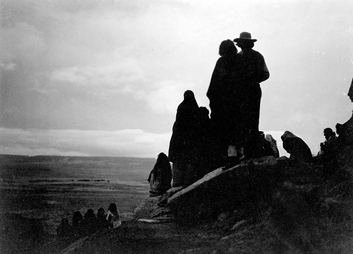 The Hopi  1905  Group of Hopi Indians looking into the distance at valley floor,1905. Photograph by Edward Curtis  1868 1952 .