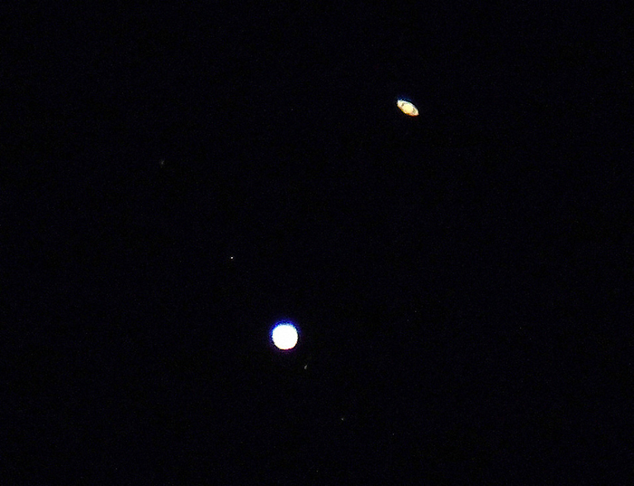 Jupiter and Saturn make their first close encounter in about 400 years Saturn  above  and Jupiter are aligned at their closest approach in 397 years. The stars lined up from upper left to lower right of Jupiter are Galilean satellites circling Jupiter.