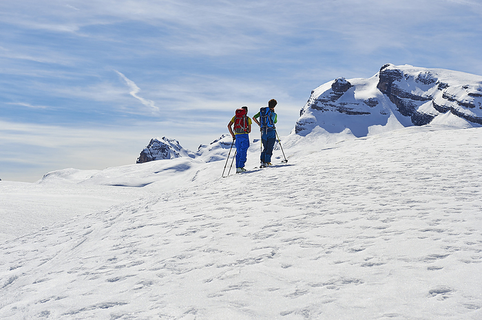 Two Men skitouring in the Area of the Brenta Dolomites Madonna di Campiglio, Looking to the mountain Cima Grosté, Skitour, Brenta Gebirge, Dolomites, Trentino, Italien, Photo by Brunner, Thilo
