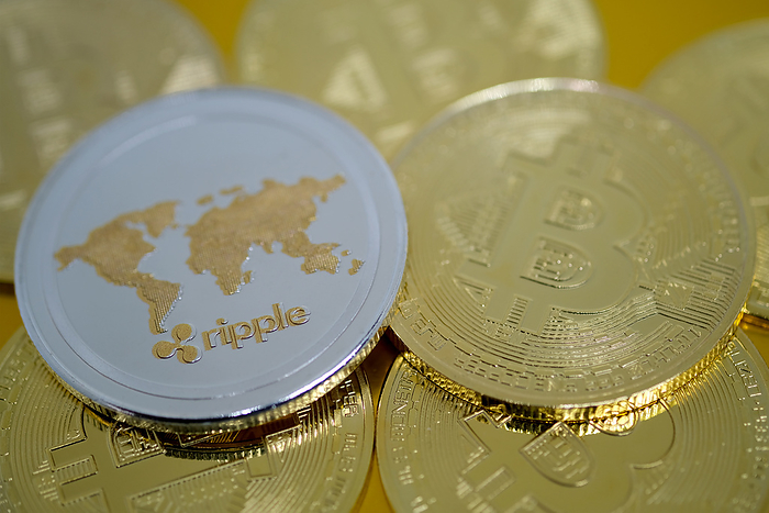 Ripple   Bitcoin Image In this photo illustration, visual representations of digital cryptocurrencies Ripple and Bitcoin are arranged on January 4, 2021 in Katwijk, Netherlands.  Photo by Yuriko Nakao AFLO   