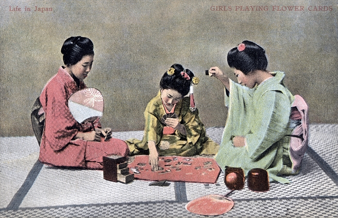 Hanafuda  Date of photograph unknown  Three young Japanese women in kimono and traditional hairdo are playing Hanafuda. One of the women holds a fan.The game inspired Kyoto businessman Fusajiro Yamauchi to found Nintendo Koppai in 1889 to produce hand crafted Hanafuda cards painted on mulberry tree bark. The company is of course now better known for its computer games.