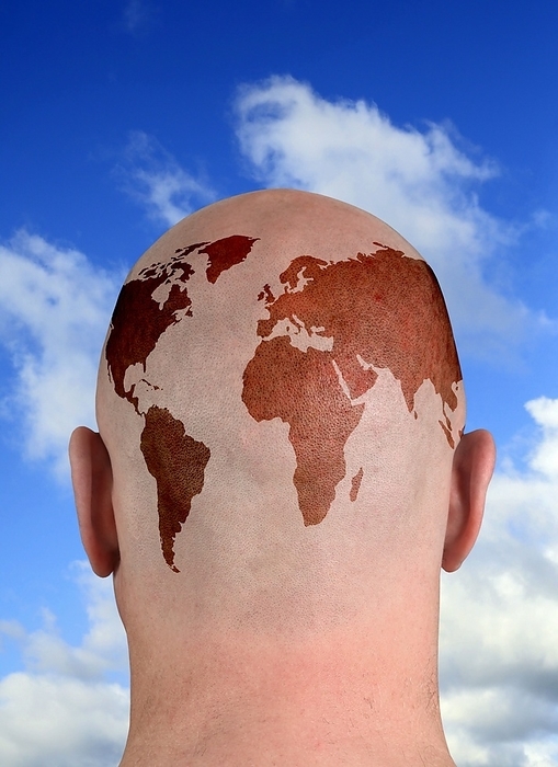 Global thinking, conceptual image Global thinking. Conceptual image of an Earth map imprinted on a man s head, representing thinking and research on a global level, such as on environmental, social and political issues.