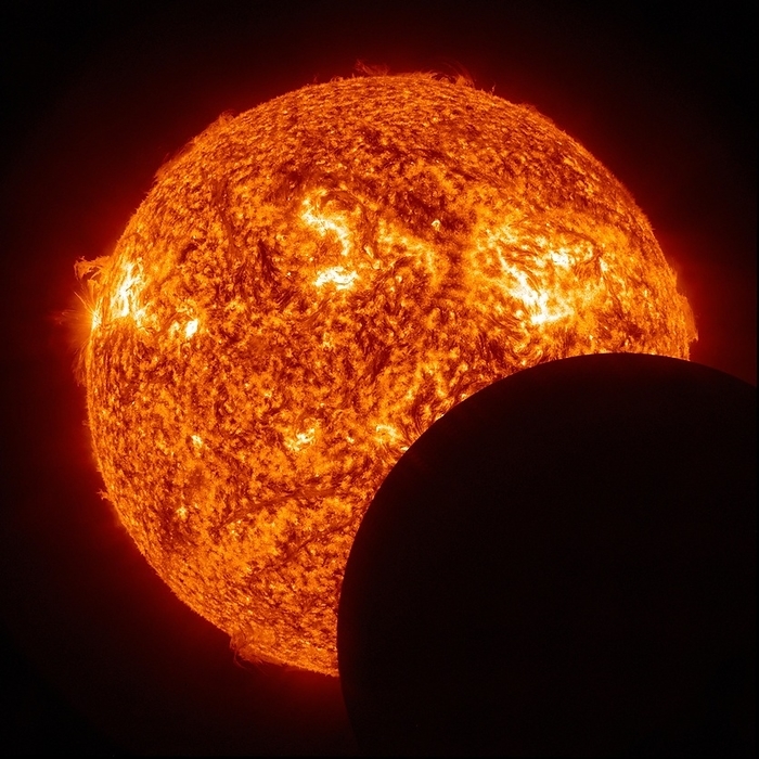 Moon transiting the Sun from the SDO Moon transiting the Sun from the SDO. Image of the Moon passing in front of the Sun as seen from NASA s Solar Dynamics Observatory  SDO . The SDO is an Earth orbiting spacecraft launched in 2010 by NASA and used to observe the Sun. It orbits the Earth in a geosynchronous orbit. This motion around the Earth, combined with the motion of the Moon around Earth and the Earth around the Sun creates opportunities for it to view transits in the same way as the Earth itself views them due to its motion. Imaged on 11th March 2013.
