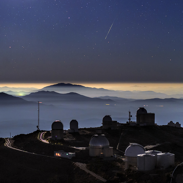 Meteor over La Silla Observatory, Chile Meteor over La Silla Observatory. View of a meteor in the night sky over the telescopes of La Silla observatory in the Atacama Desert, Chile, with inversion clouds hugging the mountains. La Silla is located at an altitude of 2400 metres and consists of three telescopes built and operated by the ESO: New Technology Telescope, ESO Telescope and the MPG ESO Telescope.