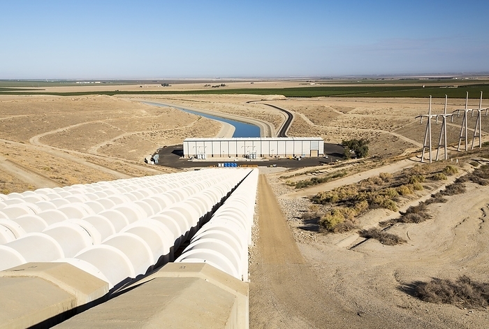 A pumping station sends water uphill A pumping station on the California aqueduct that brings water from snowmelt in the Sierra Nevada mountains to farmland in the Central Valley. Following a four year long catastrophic drought, irrigation water is in short supply, with 2 billion US Dollars annually wiped off the agriculture sector.
