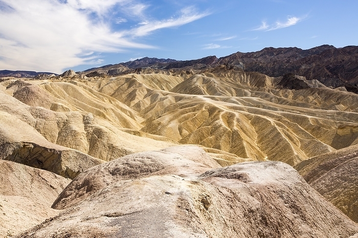 Badland scenery at Zabriskie Point Badland scenery at Zabriskie Point in Death Valley which is the lowest, hottest, driest place in the USA, with an average annual rainfall of around 2 inches, some years it does not receive any rain at all.