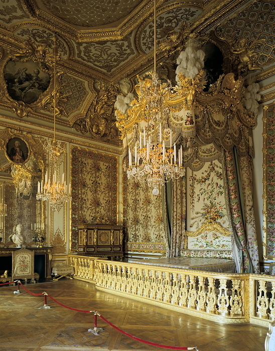 The Queen s Bedchamber, Versailles The Queen s Bedchamber, The Queen s Suite  Grand Apartment de la Reine , Chateau de Versailles, France. The Rococo style woodwork, as well as the ceiling painting by Francois Boucher  1703 1770  were commissioned around 1730 by Louis XV in order to please his wife, Maria Leszczynska. Marie Antoinette found this terribly old fashioned, and decided to replace all the furnishings, notably commissioning silk hangings woven in patterns of lilacs and peacock feathers, garnishing the alcove and the enormous four poster bed  restored in 1976 .  