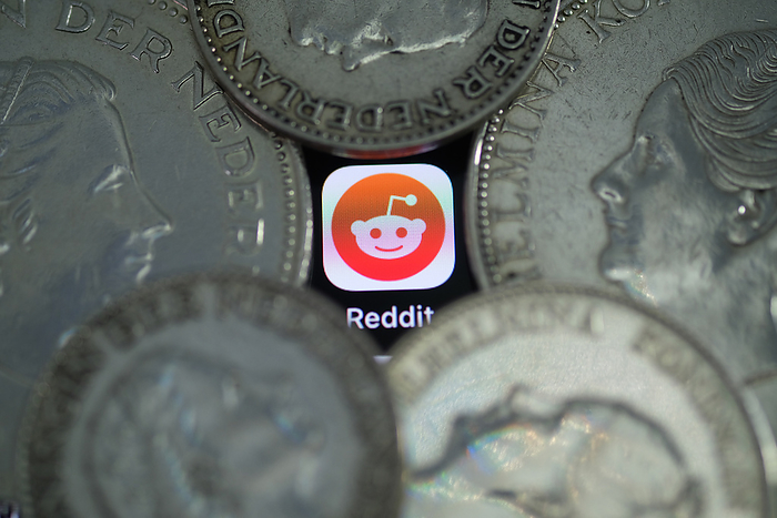 Old Dutch Coins   Redit Image In this photo illustration, Dutch silver coins are arranged around an app icon of Reddit, a social news aggregation, displayed on a smartphone on February 1, 2021 in Katwijk, Netherlands.   Photo by Yuriko Nakao AFLO   