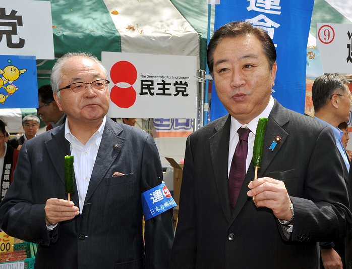 RENGO Holds May Day Prime Minister Tastes Tohoku Products April 28, 2012, Tokyo, Japan   Japan s Prime Minister Yoshihiko Noda, right, tastes agricultural products grown in Fukushima Prefecture where the stricken nuclear power plant is located during a May Day rally in Tokyo on Saturday, April 28, 2012. As a guest speaker, Noda addressed some 35,000 people attending the rally sponsored by the Japanese Trade Union Confederation. As a guest speaker, Noda addressed some 35,000 people attending the rally sponsored by the Japanese Trade Union Confederation.