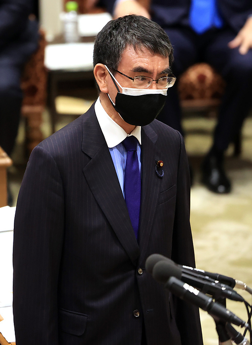 Japanese Prime Minister Yoshihide Suga attends Lower House s budget committee session February 8, 2021, Tokyo, Japan   Japanese Administrative Reform Minister Taro Kono arrives at Lower House s budget committee session at the National Diet in Tokyo on Monday, February 8, 2021. Suga cabinet s approval rating dived under 40 percent, accoding to a telephone poll.         Photo by Yoshio Tsunoda AFLO 