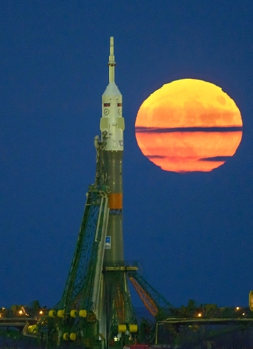 Supermoon and Soyuz rocket at Baikonur, 2016 Supermoon and Soyuz rocket at Baikonur. Supermoon rising behind a Soyuz rocket at the Baikonur Cosmodrome launch pad in Kazakhstan, on 14 November 2016. NASA astronaut Peggy Whitson, Russian cosmonaut Oleg Novitskiy of Roscosmos, and ESA astronaut Thomas Pesquet, are scheduled to launch from here on 18 November 2016 on Expedition 50 to the International Space Station. A supermoon occurs when the Moon is at perigee, the closest point to the Earth in its orbit.