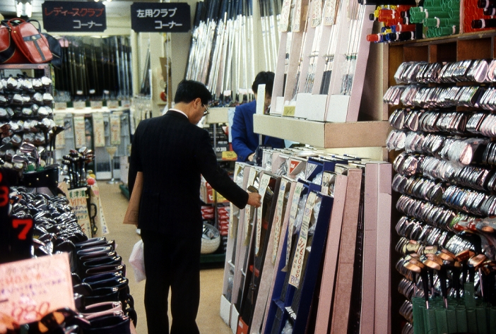 Golf equipment store  1987  Japan: 1987, Tokyo   Buisiness is brisk at a Tokyo golf shop specializing in imports.  Photo by Fujifotos AFLO  FYJ
