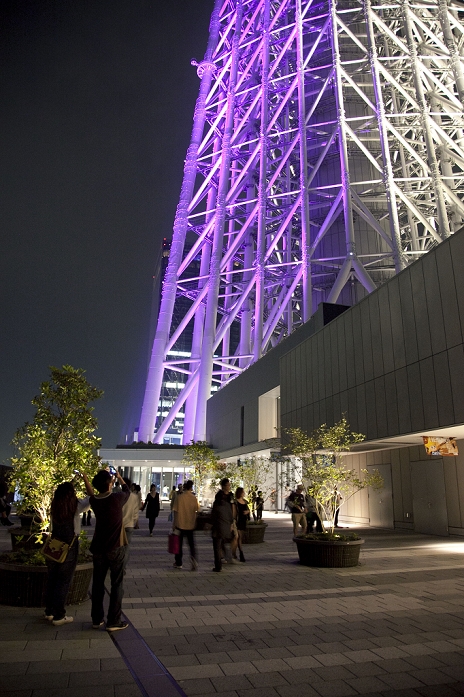 Tokyo Sky Tree Opening Chic  and  Elegant  in the night sky  May 24, 2012, Tokyo, Japan   Visitors take pictures of Tokyo Skytree illuminated in purple which represents the Japanese aesthetic sense, elegant and dignified image of the tower. Tokyo Skytree has two lighting styles, the concept of the design is based on Japanese aesthetic  Miyabi  in purple and blue  Iki  represents the essence of Kokoroiki. The tower opened to the public on May 22nd 2012 and at 634m is the worlds  2nd tallest building and the worlds  tallest tower.  Photo by Rodrigo Reyes Marin AFLO 