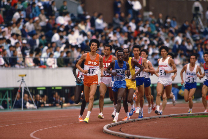 Takeyuki Nakayama (Daiei), Masanari Shintaku (SB), Juma Ikangaa (TAN)
MAY 11, 1986 - Athletics : Takeyuki Nakayama #47, Masanari Shintaku #39 and Juma Ikangaa #11 of Tanzania compete during the Men's 10000m at the Takeyuki Nakayama #47, Masanari Shintaku #39 and Juma Ikangaa #11 of Tanzania compete during the Men's 10000m at the Sponichi Athletics in Japan.
(Photo by AFLO) [0219].
