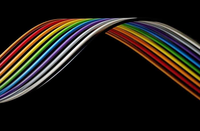 Rainbow ribbon cable Rainbow ribbon cable. A ribbon cable  also known as multi wire planar cable  is an insulated cable with many conducting wires running parallel to each other.