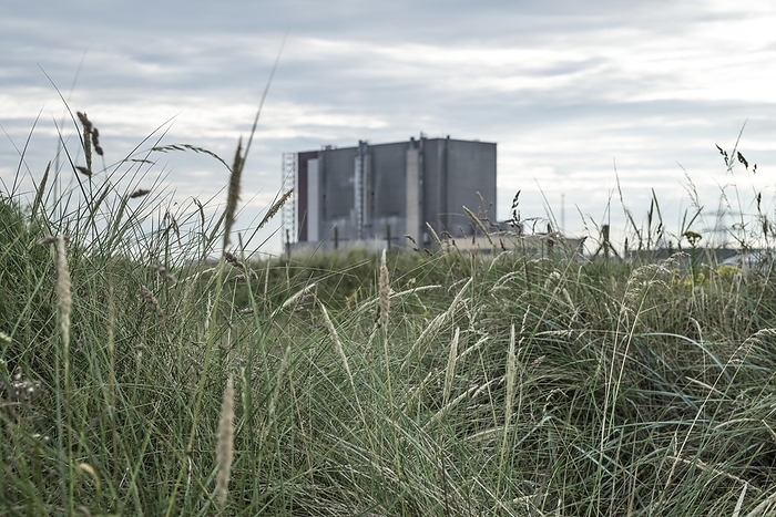 Nuclear power plant Hartlepool advanced gas cooled nuclear reactor seen beyond sand dunes