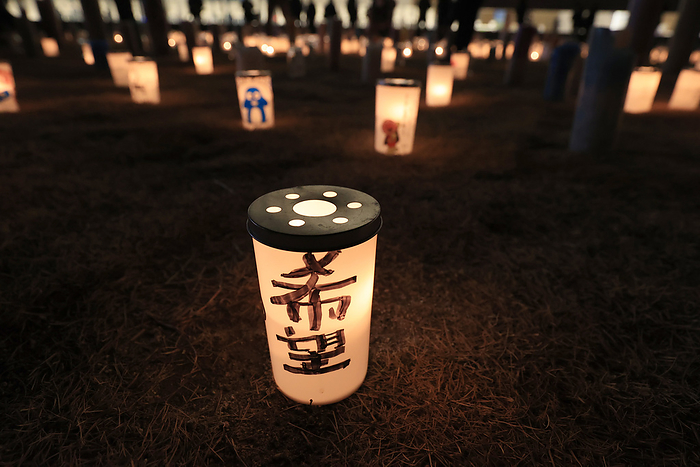 Japan will mark the 10th anniversary of earthquake, tsunami and muclear accident March 10, 2021, Futaba, Japan   A candle shows  hope  as volunteers light candles which form   our Memories connct to the Future  at Futaba town in Fukushima prefecture near crippled Tokyo Electric Power Co s  TEPCO  Fukushima Dai ichi nuclear plant on Wednesday, March 10, 2021. Japan will mark the 10th anniversary for the massive earthquake, tsunami and nuclear accident on March 11 which kipped over 20,000 people.               Photo by Yoshio Tsunoda AFLO 