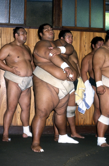 Hachijukichi KONISHIKI  1990  Japan: 1990, Tokyo   Konishiki takes part in a training session at his stable in Tokyo in 1990. Born Saleva a Fuauli Atisano e, Konishiki became the first foreign born wrestler ever to reach ozeki, the second highest rank in the sport. His career spanned 15 years from 1982 to 1997. At a peak weight of 287 kg, he was the heaviest rikishi ever in sumo, earning him the nickname  The Dump Truck.   Photo by Fujifotos AFLO  FYJ