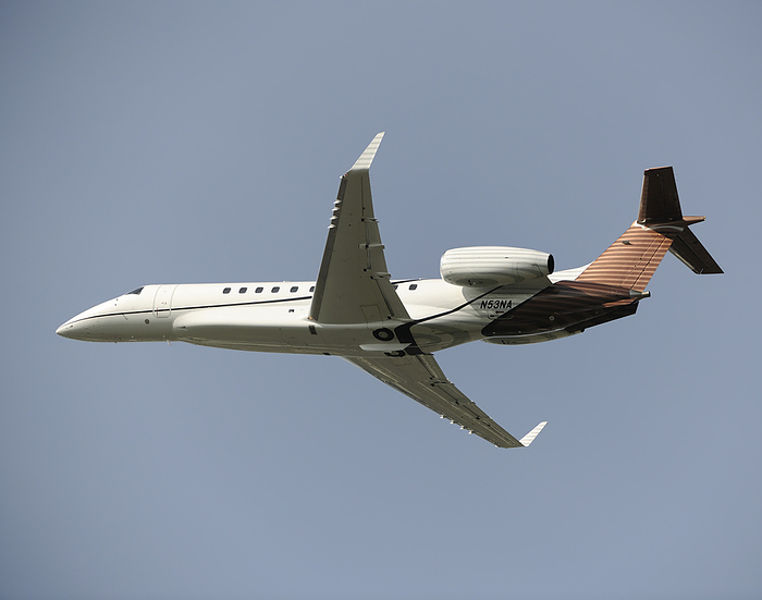 Embraer Legacy 600 private jet in flight DC3 Entertainment Embraer Legacy 600 climbing out after take off.