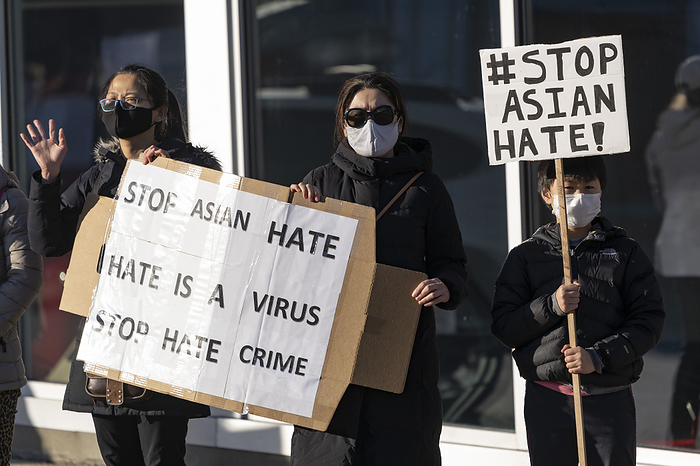 Increase in hate crimes against Asians in the U.S. Protests in Massachusetts March 19, 2021, Shawsheen Square, Andover, Massachusetts, USA: Protesters rally to protest discrimination and hate crimes against Asian and Pacific islanders during  We Stand Against Asian Hate  rally in Andover.  Robert Aaron Long, a White gunman allegedly targeted Asian American owned massage parlors around Atlanta and killed eight in a string of shootings, including six women of Asian heritage on March 16, 2021.  Hate crimes against Asian and Asian Americans have risen dramatically during the pandemic.   Photo by Keiko Hiromi AFLO  