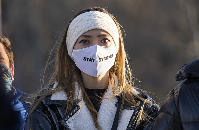 Stop Asian Hate Rally in Andover March 19, 2021, Shawsheen Square, Andover, Massachusetts, USA: Protester who is wearing  Stay Strong  face mask rallies to protest discrimination and hate crimes against Asian and Pacific islanders during  We Stand Against Asian Hate  rally in Andover.  Robert Aaron Long, a White gunman allegedly targeted Asian American owned massage parlors around Atlanta and killed eight in a string of shootings, including six women of Asian heritage on March 16, 2021.  Hate crimes against Asian and Asian Americans have risen dramatically during the pandemic.