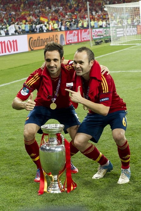 Euro 2012 Spain Won the tournament for the second year in a row  L R  Juanfran, Andres Iniesta  ESP , JULY 1, 2012   Football   Soccer : Andres Iniesta of Spain celebrates with the trophy after winning the UEFA EURO 2012 Final match between Spain 4 0 Italy at Olympic Stadium in Kiev, Ukraine.  Photo by Maurizio Borsari AFLO   0855 