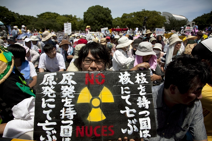 170,000 people in Yoyogi Park Shouting  Against Nuclear Power Plants  under the blazing sun  July 16, Tokyo, Japan   Young Japanese protestant displays a message that says  No Nukes  in the rally at Yoyogi Park.  Protesters against new and existing nuclear power plants organized  Goodbye to Nuclear Power Plants  and rally at different points of Tokyo, on Marine Day, July 16th.  Photo by Rodrigo Reyes Marin AFLO 