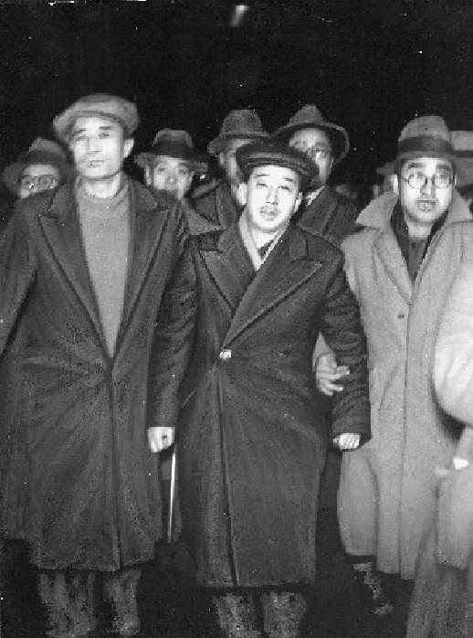 Sanzan Nosaka Postwar Politics Mr. Sanzo Nosaka, returning to Japan and being greeted by Communist Party members, January 1946 Mr. Sanso Nosaka  photo, center  returns to Japan after 16 years and is greeted by Communist Party officials at Tokyo Station  to the left of Mr. Nosaka is Yoshio Shiga.  Note: Mr. Nosaka went to the Soviet Union illegally in 1931 and worked for the Comintern in Moscow until 1940. After going to China that same year, he was in charge of educating Japanese prisoners of war in Yan an. Related to the end of the war. Photographed January 13, 1946  article only published January 14, 1946.