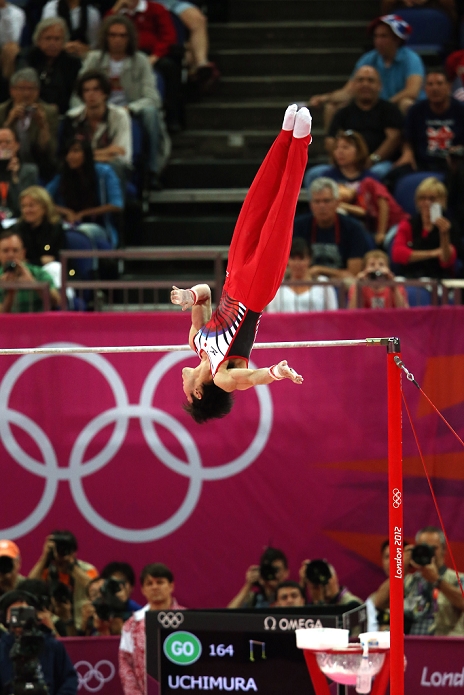 2012 London Olympics Gymnastics Men s individual all around final, bars New moon somersault on the extended body Series of photos Kohei Uchimura  JPN , AUGUST 1, 2012   Artistic Gymnastics : Kohei Uchimura of Japan performs on the horizontal bar in the Men s Individual All  Around Final at North Greenwich Arena during the London 2012 Olympic Games in London, UK.  Photo by Koji Aoki AFLO SPORT   0008 .
