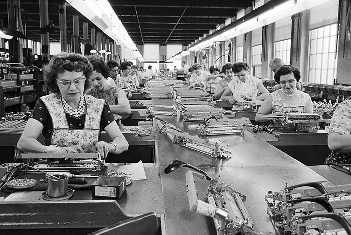 Typewriter factory, 1960s Typewriter factory, 1960s. Photographed by Warren K. Leffler on 5 July 1962, in Hartford, Connecticut, USA, at a factory owned by the Olivetti company.