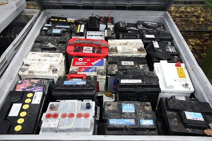 Car battery disposal Car battery disposal. Used car batteries packed inside a container. This type of battery contains a mixture of lead and acid. Car batteries can be recycled.