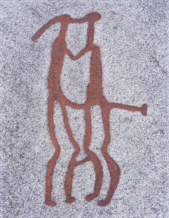 Nordic Bronze Age petroglyph Nordic Bronze Age petroglyph. This petroglyph is part of the Vitlyckehall, a large flat rock containing many similar petroglyphs. This image depicts a man and a woman kissing. The surrounding area has been declared a World Heritage Site by UNESCO. Photographed in Tanumshede, Bohuslan, Vastra Gotaland, Sweden.