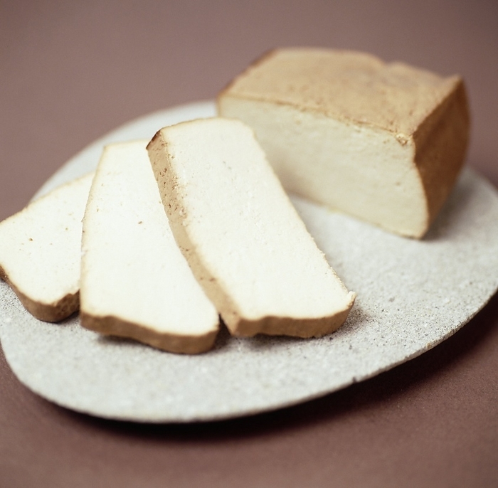 Tofu Tofu. Sliced blocks of tofu on a dish. Tofu is a curd made from soya beans  Glycine max . Soya is high in protein and a good source of B vitamins.