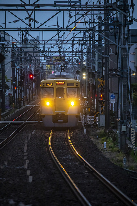 Nogata 2021.04.03   A train approaches Nogata station. Nogata, Nakano city, Tokyo, Japan   Photo by Ivo Gonzalez