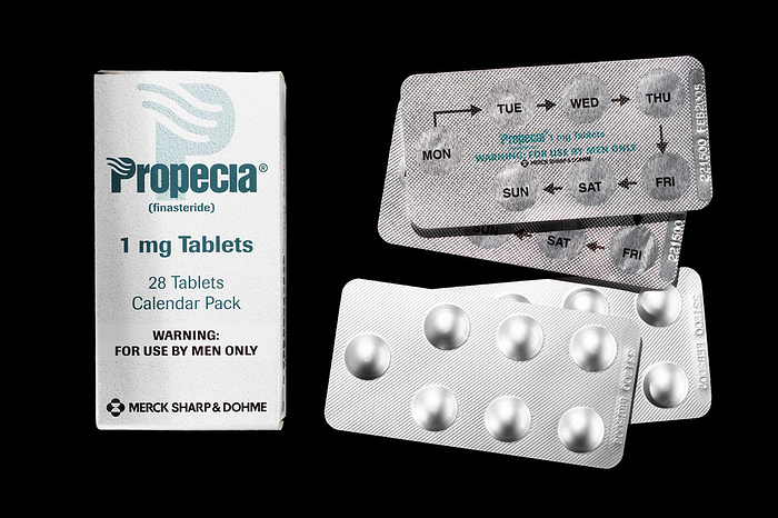Hair loss pills Propecia hair loss pill packets. The pills contain the drug finasteride, which acts to block the formation of the hormone dehydroxytestosterone  DHT . It is thought that DHT causes hair loss in men. Propecia has been shown to slow or halt male pattern hair loss  androgenetic alopecia  in some cases and some regrowth occurred in a small amount of cases. It is only intended for hair loss from the top of the head, not a receding hairline. One tablet is taken daily. Pregnant women must avoid the drug, as it may cause abnormalities in a male baby s sex organs. Larger amounts of finasteride are used for shrinking an enlarged prostate gland. Propecia is manufactured by Merck Sharp   Dohme.