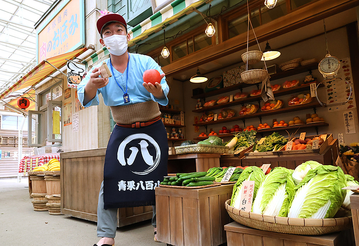 Seibuen Yuenchi Renewed Media Preview May 18, 2021, Tokorozawa, Japan   An actor performs as a greengrocer at the renovated Seibuen amusement park which has the  Showa Retro , post WWII period atmosphere shopping arcade at a press preview in Tokorozawa, suburban Tokyo on Tuesday, May 18, 2021. Seibuen amusement park, closed temporarily last year for fully renovation, will reopen on May 19 with the new attractions.      Photo by Yoshio Tsunoda AFLO  
