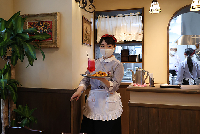 Seibuen amusement park is fully renovated and will reopen with the new attractions May 18, 2021, Tokorozawa, Japan   An actress performs as a waitress delivering meal at the renovated Seibuen amusement park which has the  Showa Retro , post WWII period atmosphere shopping arcade at a press preview in Tokorozawa, suburban Tokyo on Tuesday, May 18, 2021. Seibuen amusement park, closed temporarily last year for fully renovation, will reopen on May 19 with the new attractions.      Photo by Yoshio Tsunoda AFLO  