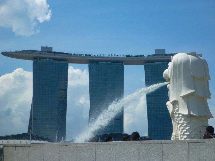 Merlion, the symbol of Singapore, and the Marina Bay Sands Hotel in the background